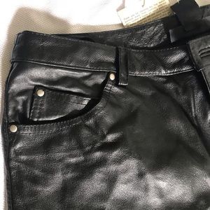 Black leather jeans- never worn